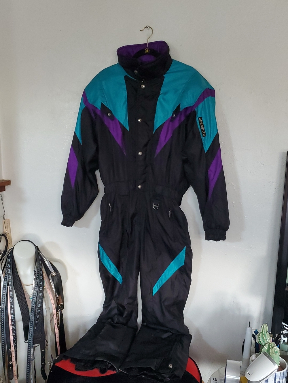 Descente Men's Black Ski One-Piece with Teal and Purple Panels